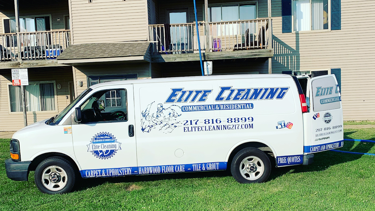 Elite Cleaning van parked at an apartment complex